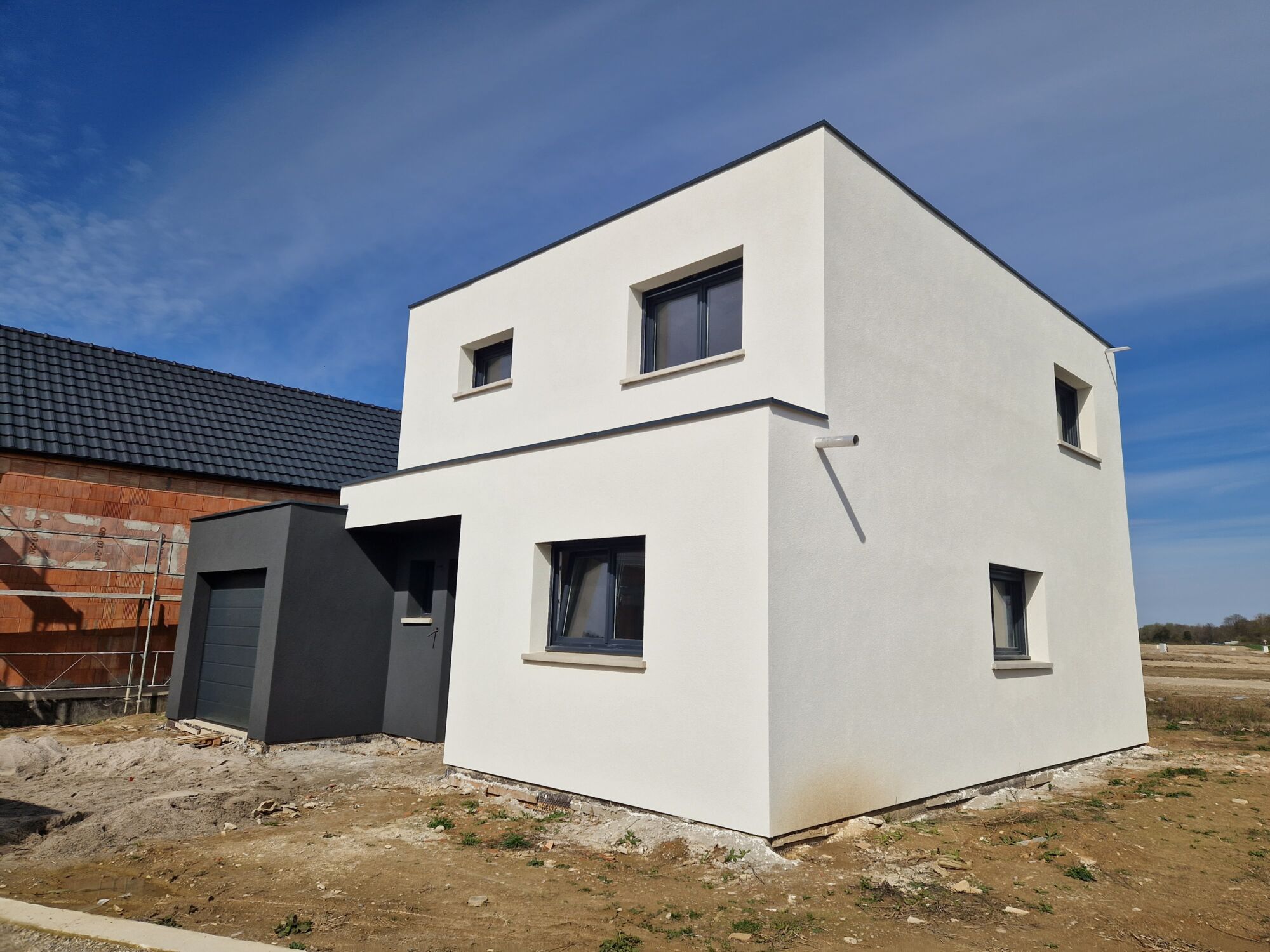20230328_144820 | Forbati Chantier enduit projeté ravalement de façade sur maison neuf Erstein